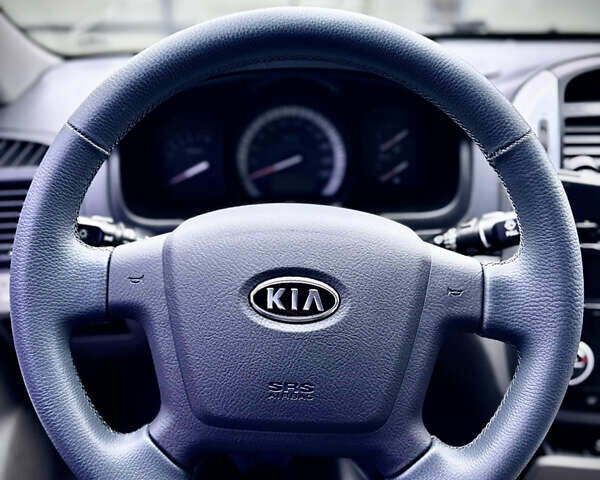 Синий Киа Черато, объемом двигателя 1.98 л и пробегом 151 тыс. км за 5500 $, фото 2 на Automoto.ua