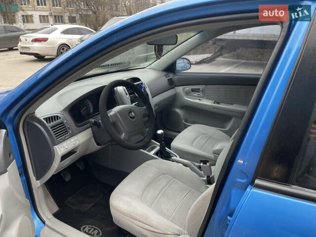 Синий Киа Черато, объемом двигателя 1.59 л и пробегом 200 тыс. км за 2999 $, фото 12 на Automoto.ua