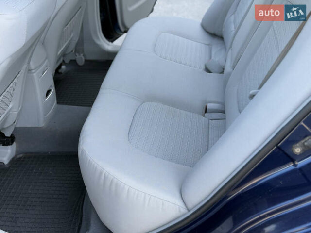 Синий Киа Черато, объемом двигателя 2 л и пробегом 190 тыс. км за 5799 $, фото 10 на Automoto.ua