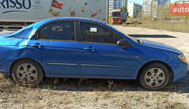 Синий Киа Черато, объемом двигателя 1.6 л и пробегом 220 тыс. км за 1350 $, фото 1 на Automoto.ua
