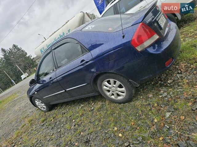 Синій Кіа Черато, об'ємом двигуна 1.98 л та пробігом 300 тис. км за 3900 $, фото 8 на Automoto.ua