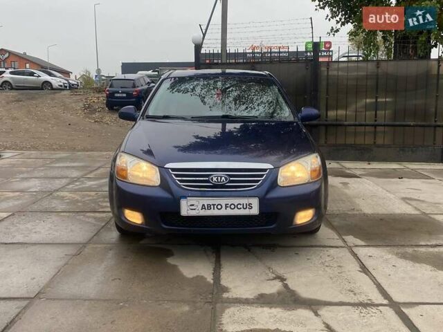 Синій Кіа Черато, об'ємом двигуна 2 л та пробігом 233 тис. км за 4690 $, фото 1 на Automoto.ua