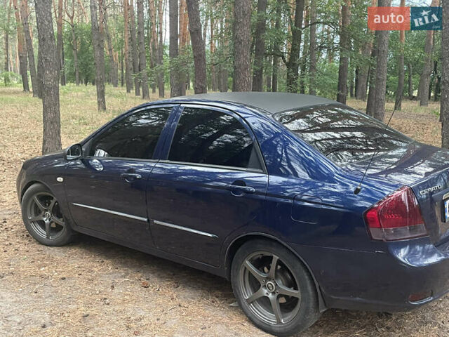Синий Киа Черато, объемом двигателя 1.59 л и пробегом 288 тыс. км за 4200 $, фото 1 на Automoto.ua