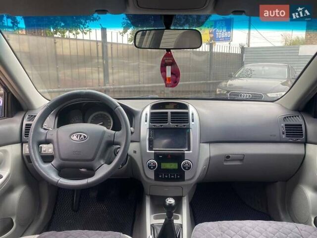 Синій Кіа Черато, об'ємом двигуна 2 л та пробігом 233 тис. км за 4690 $, фото 12 на Automoto.ua