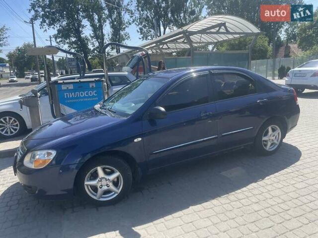 Синий Киа Черато, объемом двигателя 1.6 л и пробегом 255 тыс. км за 3300 $, фото 6 на Automoto.ua