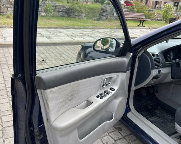 Синій Кіа Черато, об'ємом двигуна 1.6 л та пробігом 291 тис. км за 3500 $, фото 6 на Automoto.ua