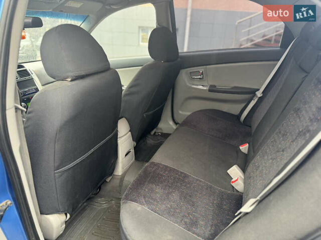 Синий Киа Черато, объемом двигателя 1.59 л и пробегом 258 тыс. км за 3000 $, фото 13 на Automoto.ua