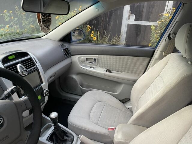 Синий Киа Черато, объемом двигателя 1.6 л и пробегом 22 тыс. км за 3100 $, фото 9 на Automoto.ua