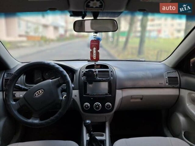 Синий Киа Черато, объемом двигателя 1.59 л и пробегом 260 тыс. км за 3800 $, фото 8 на Automoto.ua