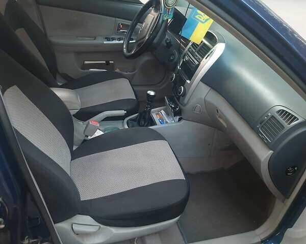 Синій Кіа Черато, об'ємом двигуна 0 л та пробігом 250 тис. км за 4300 $, фото 6 на Automoto.ua