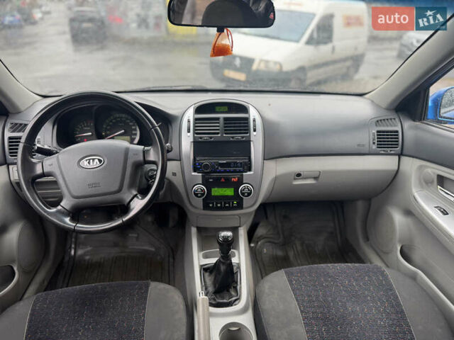 Синий Киа Черато, объемом двигателя 1.59 л и пробегом 258 тыс. км за 3000 $, фото 14 на Automoto.ua