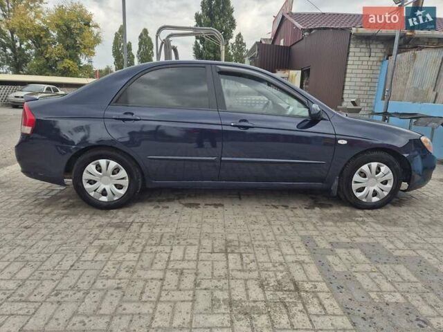 Синий Киа Черато, объемом двигателя 1.98 л и пробегом 252 тыс. км за 4200 $, фото 7 на Automoto.ua