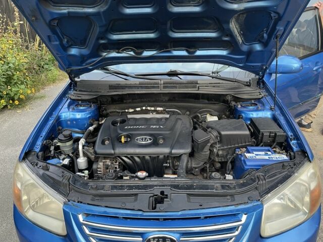 Синий Киа Черато, объемом двигателя 1.6 л и пробегом 22 тыс. км за 3100 $, фото 12 на Automoto.ua