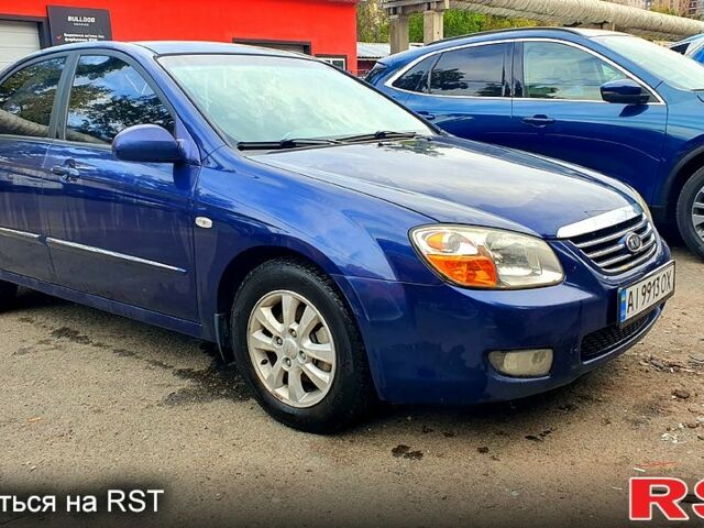 Синий Киа Черато, объемом двигателя 2 л и пробегом 233 тыс. км за 4800 $, фото 9 на Automoto.ua