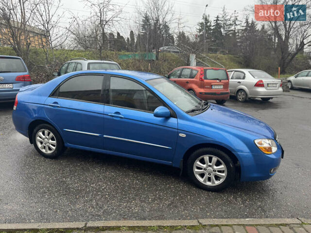 Синий Киа Черато, объемом двигателя 1.59 л и пробегом 258 тыс. км за 3000 $, фото 2 на Automoto.ua