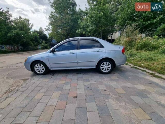 Синий Киа Черато, объемом двигателя 1.6 л и пробегом 255 тыс. км за 3300 $, фото 4 на Automoto.ua