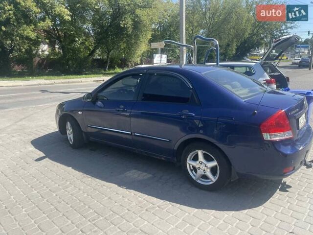 Синий Киа Черато, объемом двигателя 1.6 л и пробегом 255 тыс. км за 3300 $, фото 10 на Automoto.ua