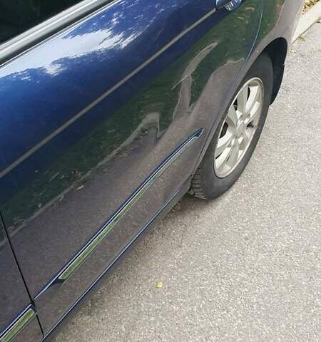 Синій Кіа Черато, об'ємом двигуна 2 л та пробігом 233 тис. км за 3900 $, фото 14 на Automoto.ua