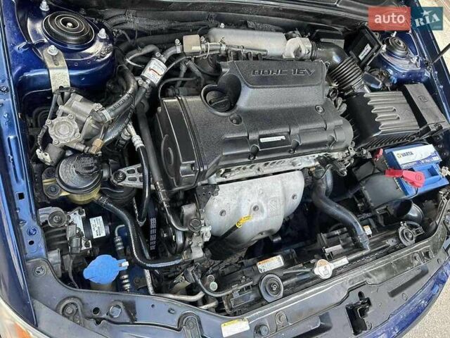 Синій Кіа Черато, об'ємом двигуна 1.98 л та пробігом 250 тис. км за 5700 $, фото 4 на Automoto.ua