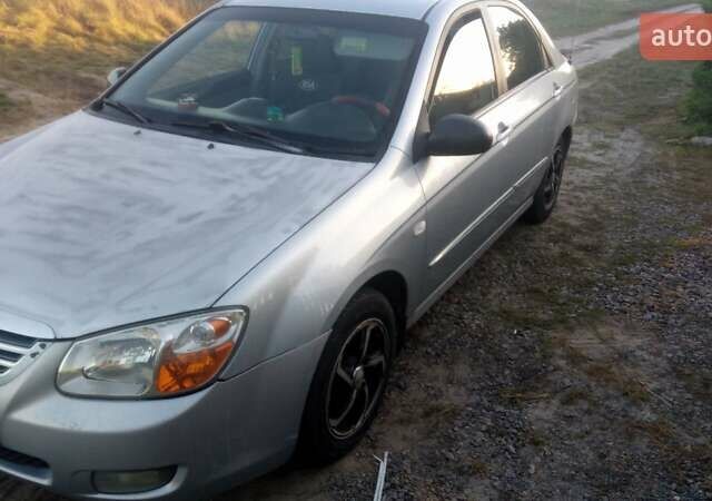 Синий Киа Черато, объемом двигателя 1.6 л и пробегом 250 тыс. км за 4500 $, фото 13 на Automoto.ua