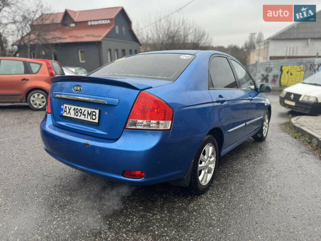 Синий Киа Черато, объемом двигателя 1.59 л и пробегом 258 тыс. км за 3000 $, фото 5 на Automoto.ua