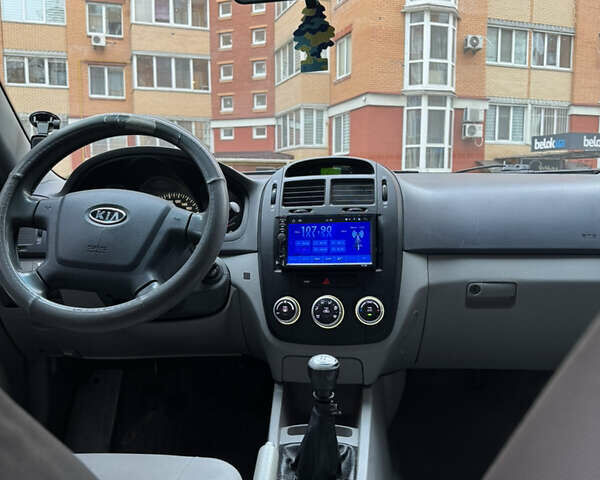 Синий Киа Черато, объемом двигателя 1.6 л и пробегом 280 тыс. км за 2750 $, фото 8 на Automoto.ua