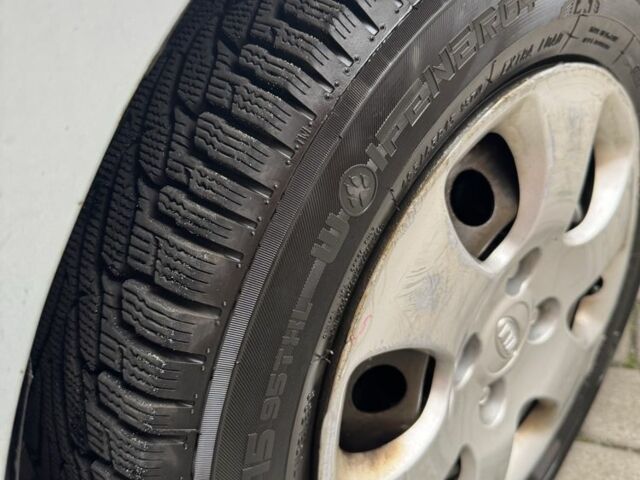 Синий Киа Черато, объемом двигателя 1.6 л и пробегом 280 тыс. км за 2750 $, фото 6 на Automoto.ua