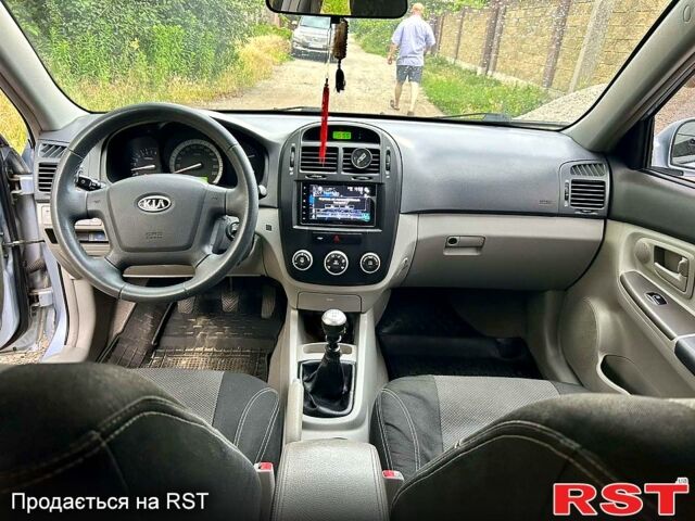 Синій Кіа Черато, об'ємом двигуна 1.6 л та пробігом 182 тис. км за 5000 $, фото 3 на Automoto.ua