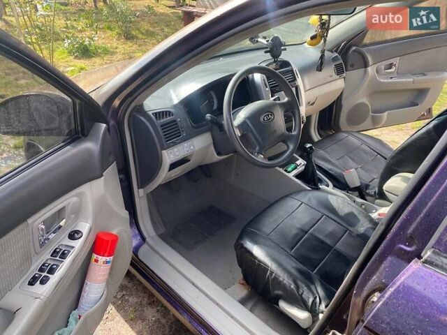Киа Черато 2007 в Житомире на Automoto.ua Синий Киа Черато, объемом двигателя 1.98 л и пробегом 182 тыс. км за 3000 $, фото 4 на Automoto.ua