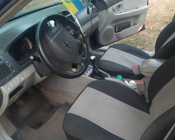 Синій Кіа Черато, об'ємом двигуна 0 л та пробігом 250 тис. км за 4300 $, фото 5 на Automoto.ua