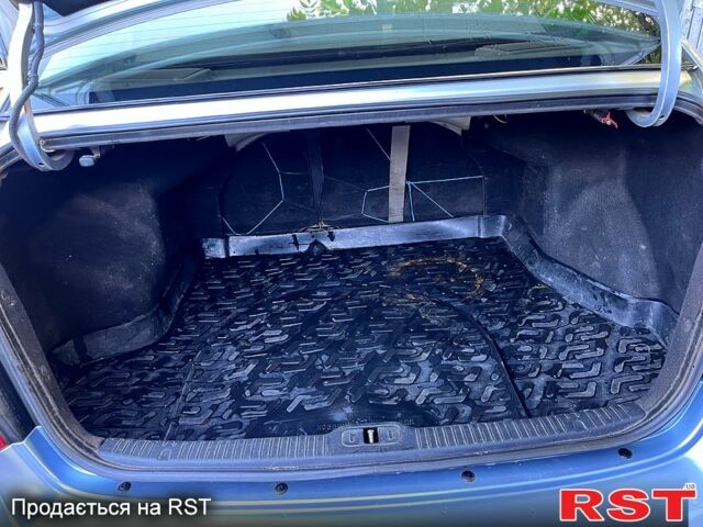 Синий Киа Черато, объемом двигателя 1.6 л и пробегом 183 тыс. км за 4500 $, фото 5 на Automoto.ua