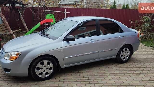 Синий Киа Черато, объемом двигателя 1.59 л и пробегом 161 тыс. км за 4200 $, фото 12 на Automoto.ua