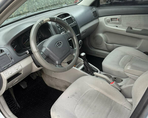 Синий Киа Черато, объемом двигателя 1.6 л и пробегом 280 тыс. км за 2750 $, фото 9 на Automoto.ua