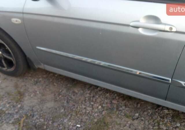 Синий Киа Черато, объемом двигателя 1.6 л и пробегом 250 тыс. км за 4500 $, фото 4 на Automoto.ua