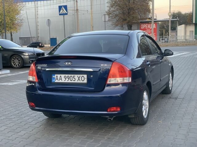 Синій Кіа Черато, об'ємом двигуна 2 л та пробігом 280 тис. км за 3999 $, фото 3 на Automoto.ua