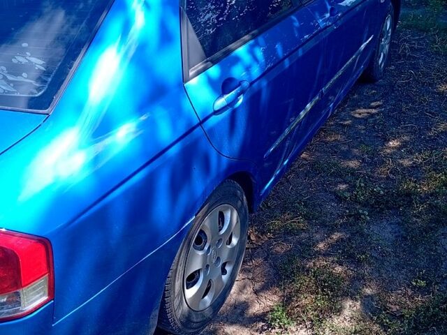 Синій Кіа Черато, об'ємом двигуна 1.6 л та пробігом 300 тис. км за 4000 $, фото 2 на Automoto.ua