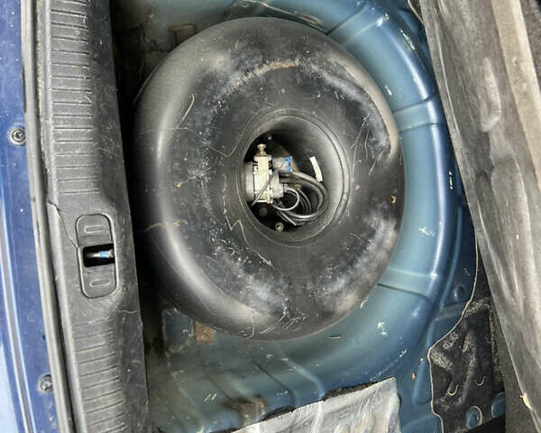 Синій Кіа Черато, об'ємом двигуна 1.6 л та пробігом 291 тис. км за 3500 $, фото 17 на Automoto.ua