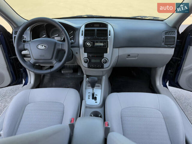 Синий Киа Черато, объемом двигателя 2 л и пробегом 190 тыс. км за 5799 $, фото 14 на Automoto.ua