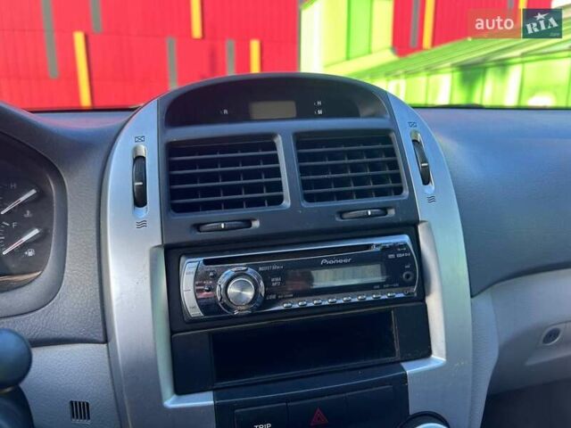 Синій Кіа Черато, об'ємом двигуна 2 л та пробігом 110 тис. км за 6390 $, фото 20 на Automoto.ua