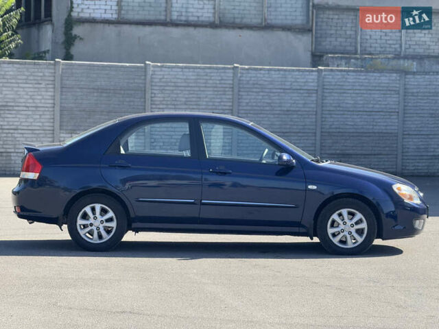 Синий Киа Черато, объемом двигателя 2 л и пробегом 190 тыс. км за 5799 $, фото 5 на Automoto.ua