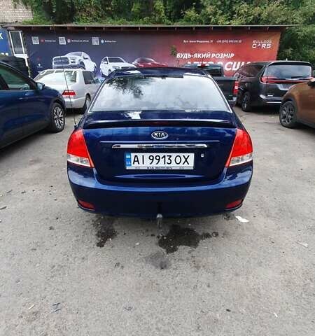 Синий Киа Черато, объемом двигателя 2 л и пробегом 233 тыс. км за 5100 $, фото 4 на Automoto.ua