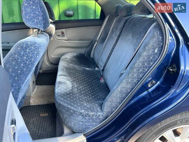 Синий Киа Черато, объемом двигателя 2 л и пробегом 110 тыс. км за 5790 $, фото 11 на Automoto.ua