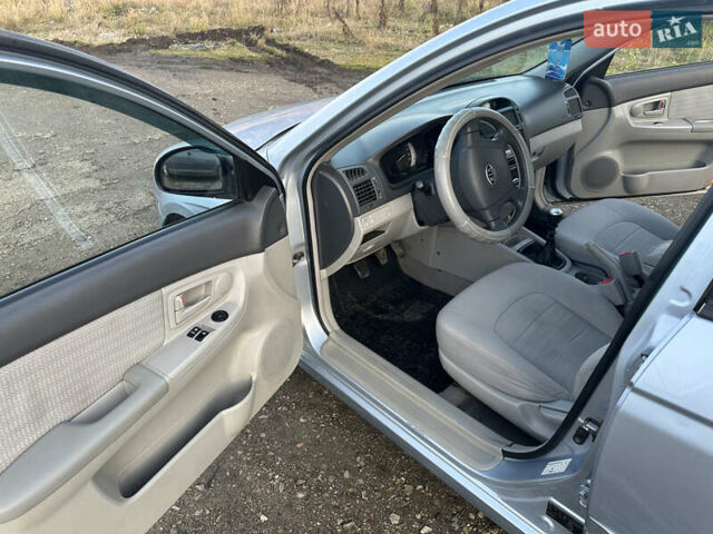 Синий Киа Черато, объемом двигателя 1.6 л и пробегом 192 тыс. км за 4400 $, фото 8 на Automoto.ua