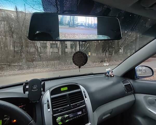 Синій Кіа Черато, об'ємом двигуна 1.98 л та пробігом 212 тис. км за 4200 $, фото 11 на Automoto.ua