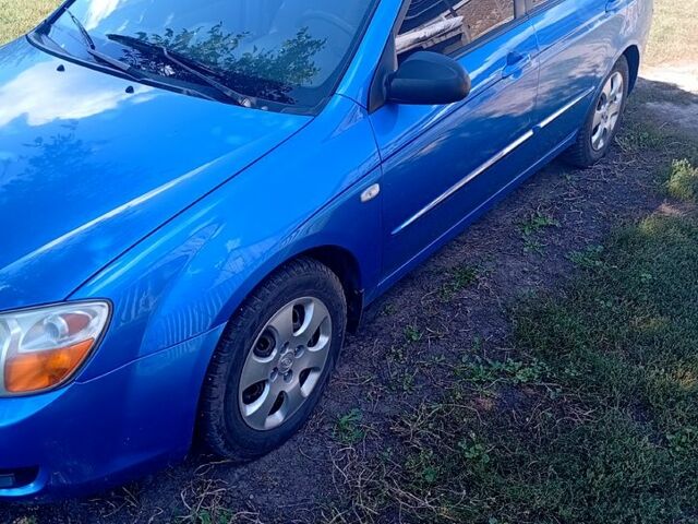 Синій Кіа Черато, об'ємом двигуна 1.6 л та пробігом 300 тис. км за 4000 $, фото 1 на Automoto.ua