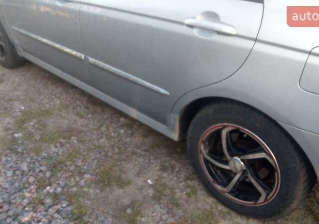 Синий Киа Черато, объемом двигателя 1.6 л и пробегом 250 тыс. км за 4500 $, фото 10 на Automoto.ua