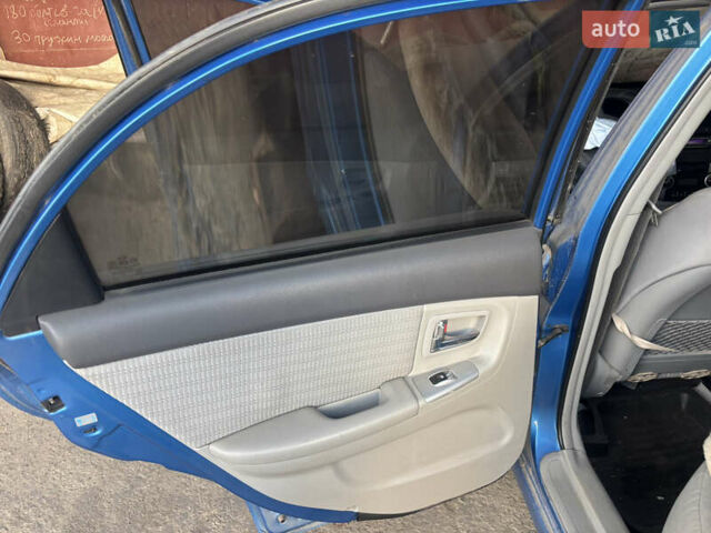 Синий Киа Черато, объемом двигателя 1.6 л и пробегом 140 тыс. км за 1400 $, фото 8 на Automoto.ua