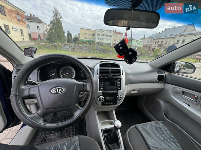 Синій Кіа Черато, об'ємом двигуна 1.6 л та пробігом 291 тис. км за 3500 $, фото 5 на Automoto.ua