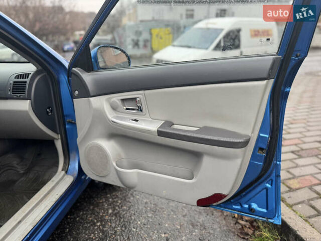 Синий Киа Черато, объемом двигателя 1.59 л и пробегом 258 тыс. км за 3000 $, фото 7 на Automoto.ua