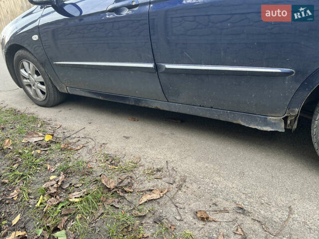 Синій Кіа Черато, об'ємом двигуна 1.6 л та пробігом 170 тис. км за 3700 $, фото 6 на Automoto.ua